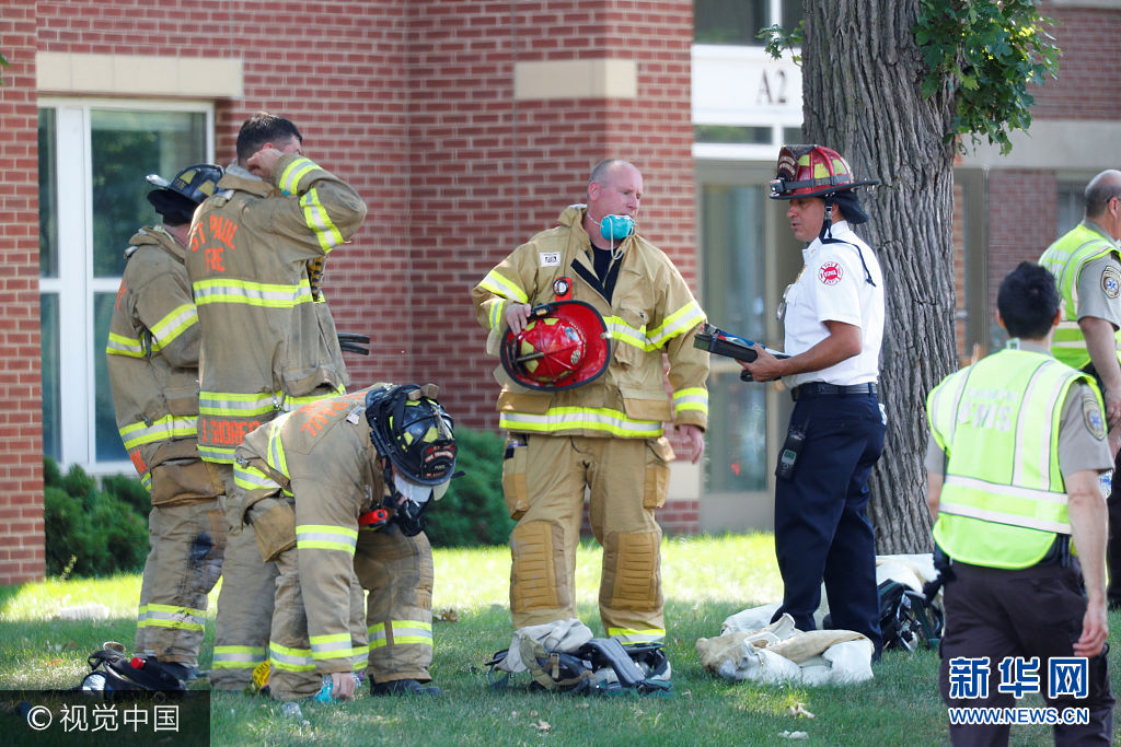 Emergency personnel work at the scene of school building collapse at Minnehaha Academy in Minneapolis, Minnesota, U.S., August 2, 2017. Adam Bettcher