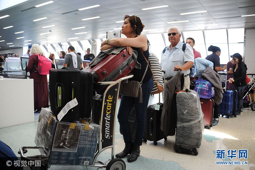 People crowd Fort Lauderdale International Airport as evacuation is underway for the arrival of Hurricane Irma, September 7, 2017 in Fort Lauderdale, Florida. Hurricane Irma, one of the most powerful Atlantic storms on record, cut a deadly swath through a string of small Caribbean islands and was on a collision course with Puerto Rico and potentially south Florida. Michele Eve Sandberg
